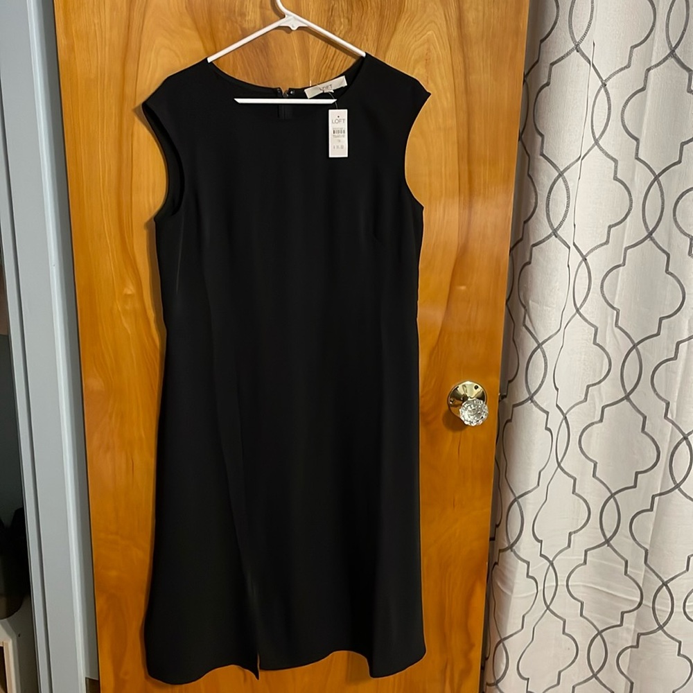 Black dress from Loft. Never worn. Size 14.